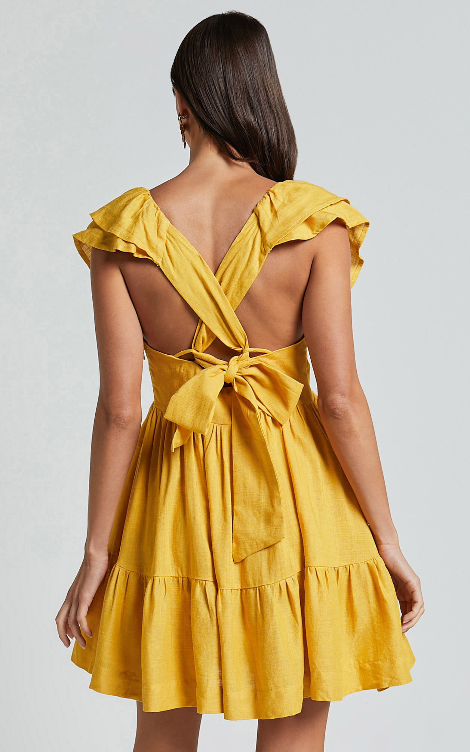 Amalie The Label - Hescia Linen Blend Frill Detail Low Back Mini Dress in Warm Yellow Gold